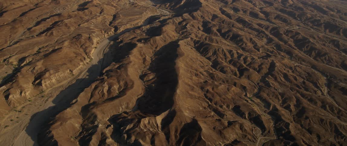 Paths carved through dirt hills