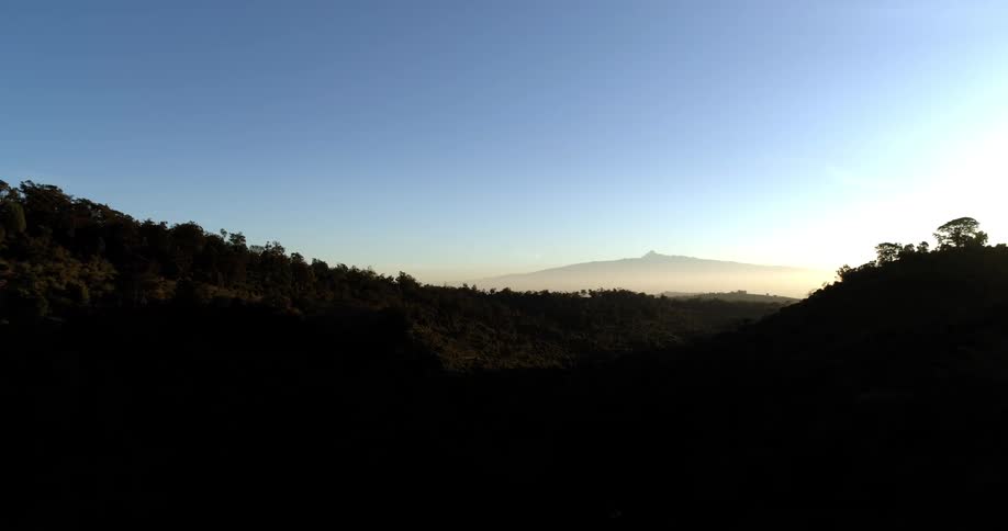 The hills are covered in thick shadows