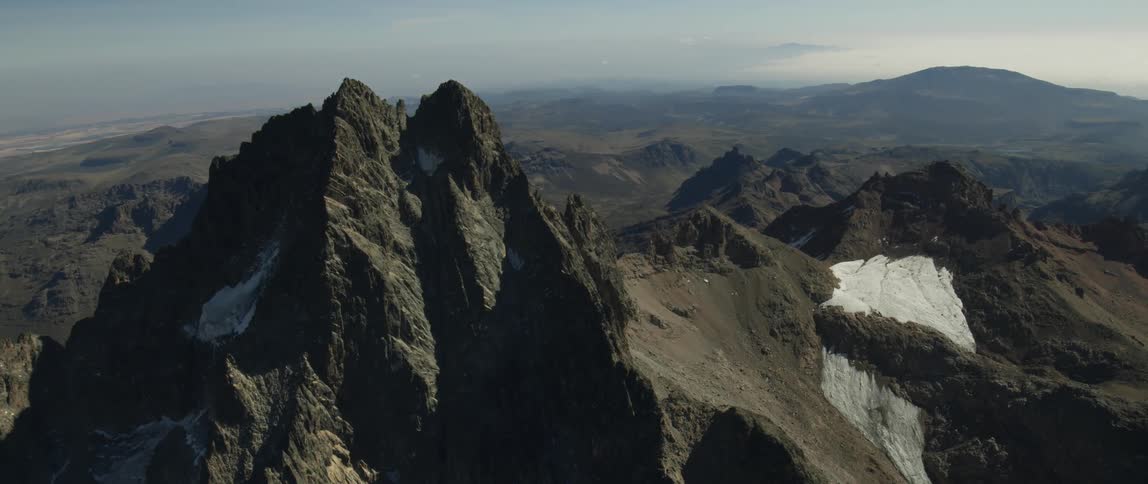 Jagged peaks and ridges on a sunny day