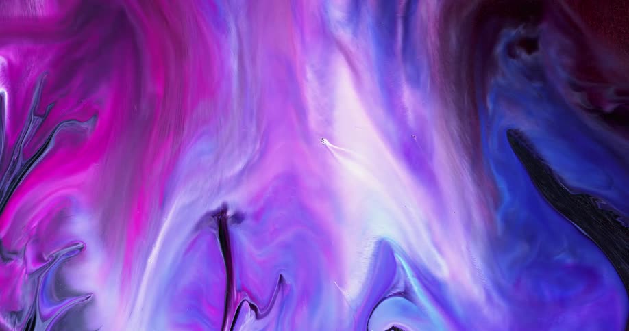 Pink and purple liquid spreads around