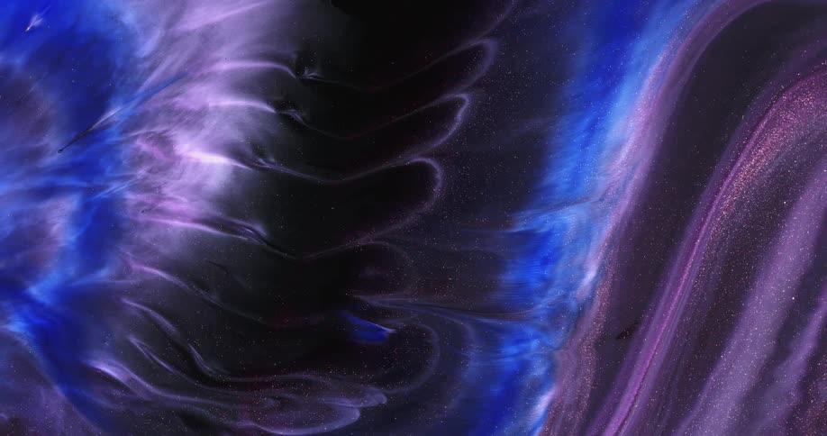 Several colors of liquid swirling together