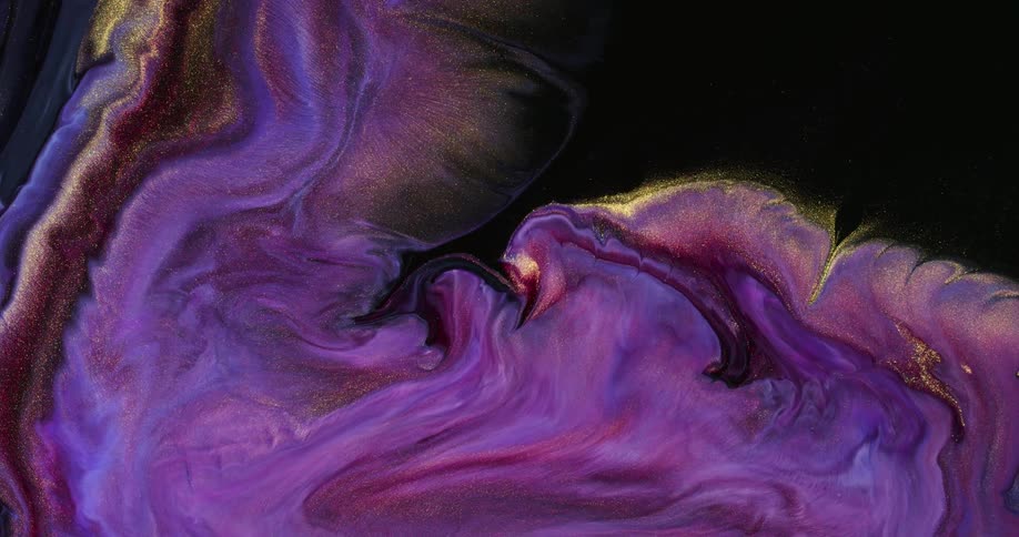 Different colors of liquid swirl together