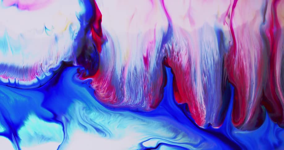 Colorful paint swirls and flows