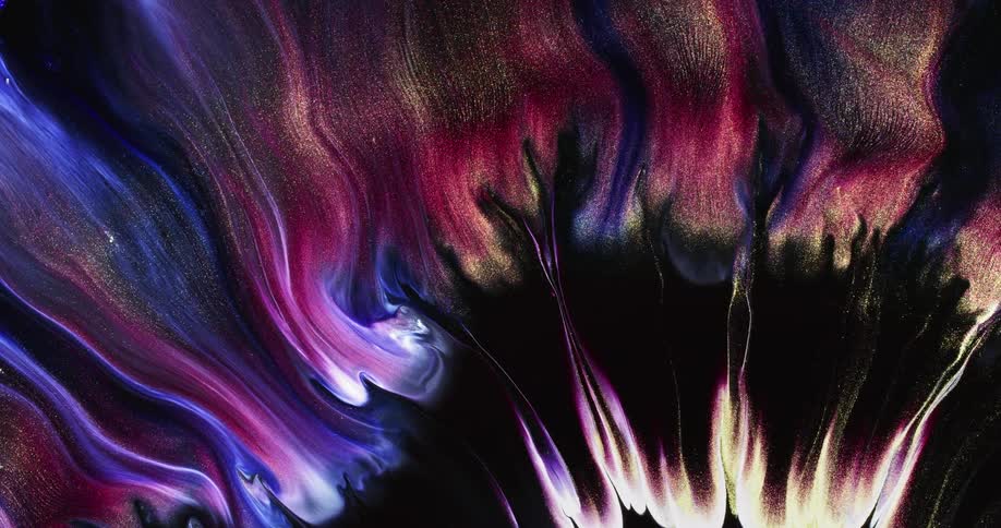 The different color inks are swirling together