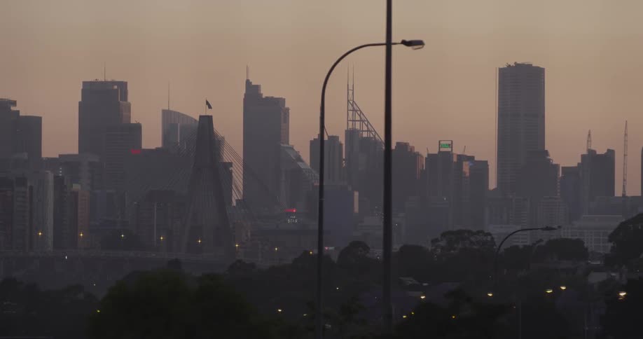 A city skyline on a hazy evening