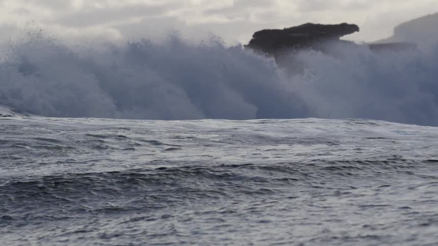 Ocean waves crashing towards the shore