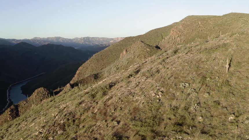Rocky grassy mountains on a clear day