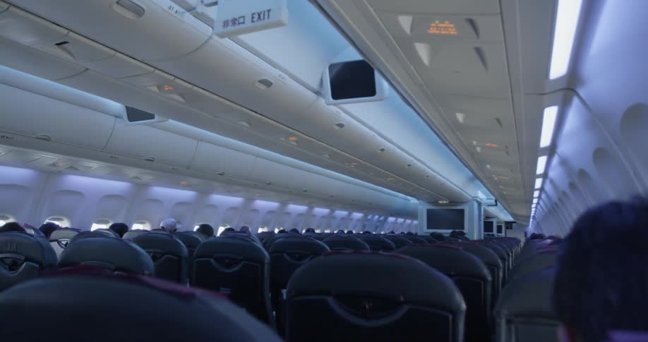 People are sitting in the large plane
