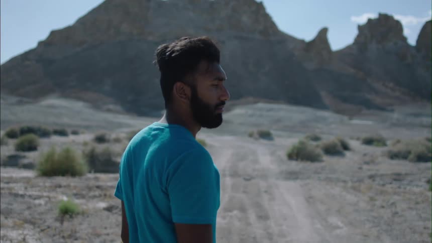 A person in a blue shirt