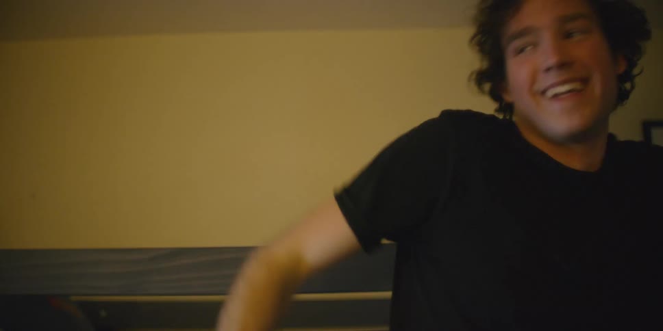 A man is jumping around dancing