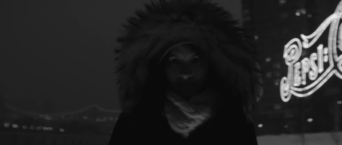 Woman wearing heavy coat standing outside