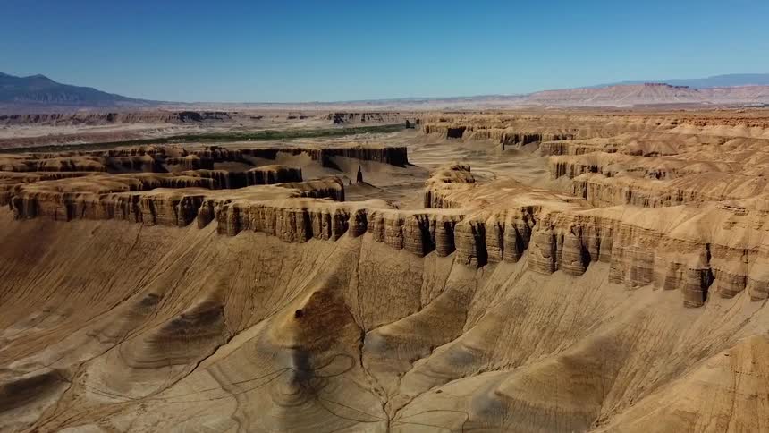The rocky hills ahead are brown in color