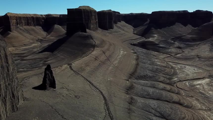 Rock formations and ridges in a canyon on a sunny day