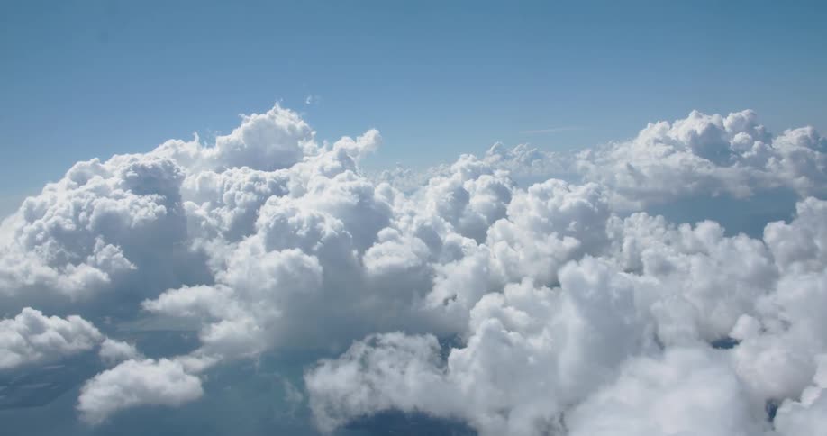 Puffy white clouds on a sunny day