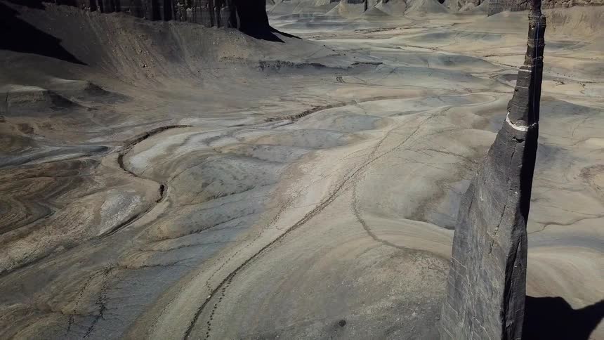 The canyon is covered with rocks and sand
