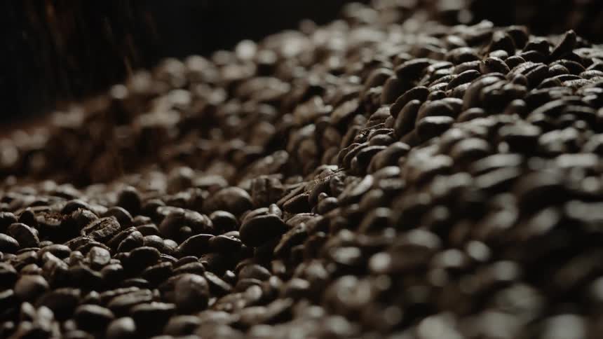 Large pile of coffee beans spins around