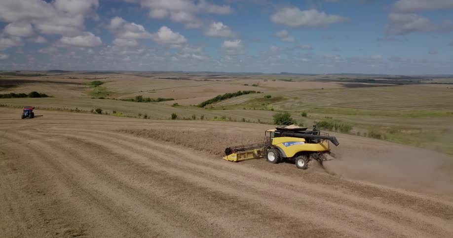 The farm vehicle is working the field