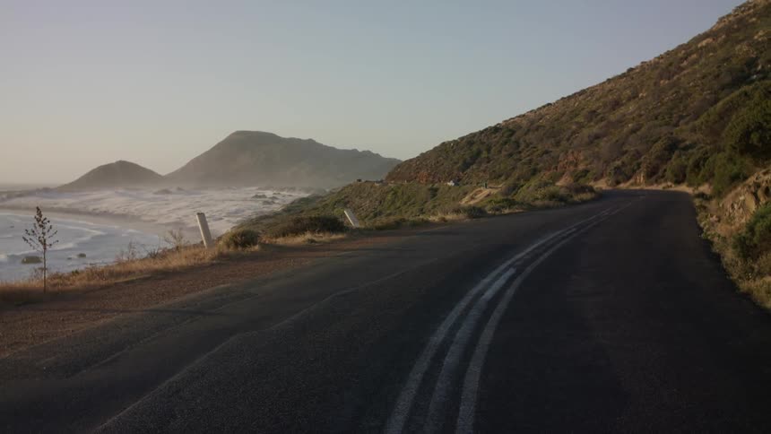 The winding road is by the shore