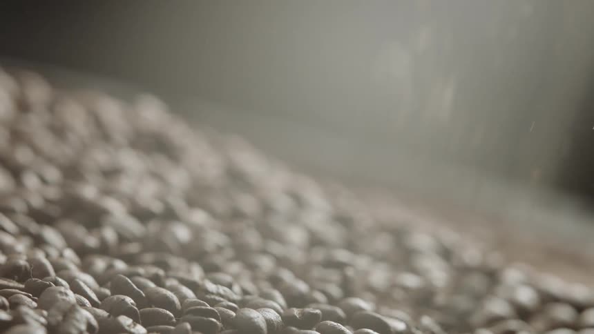 Beans pouring down into a pile