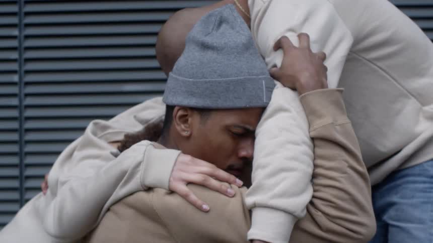 A group of people hug