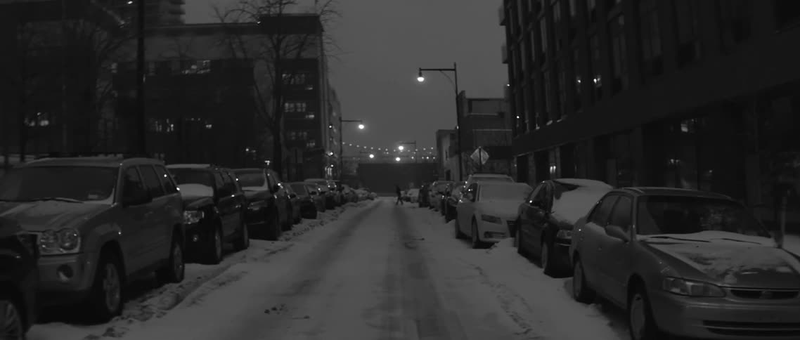 Person crossing a snowy street