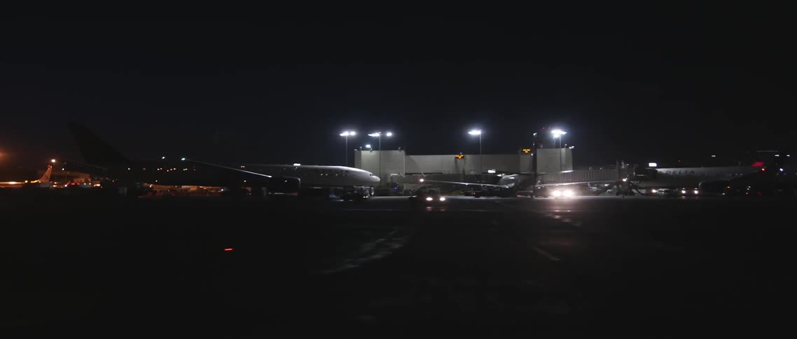 An airport terminal at night