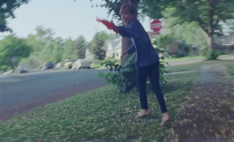 Child runs and turns around and points a toy gun