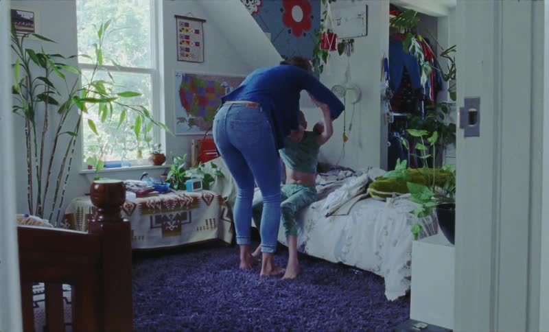 Woman fights with a child in his bedroom