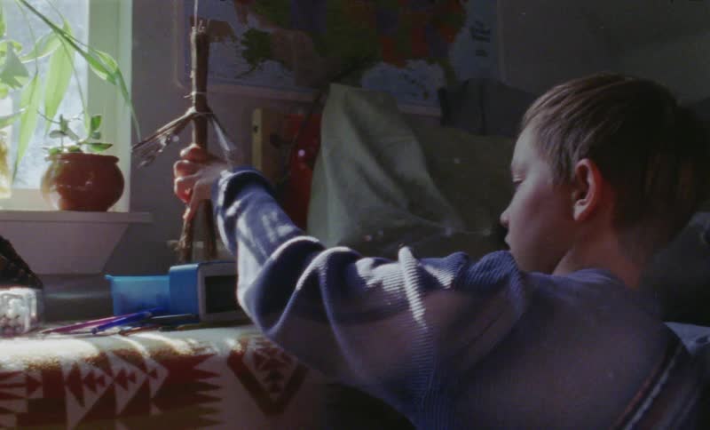 Boy plays in his bedroom