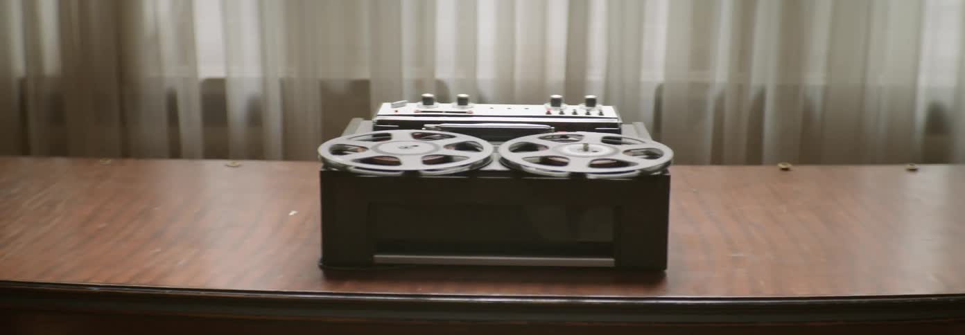 Tape reels on a tape player spin around