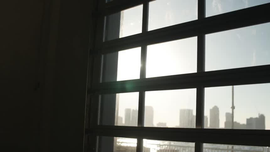 The sun shining through window panes