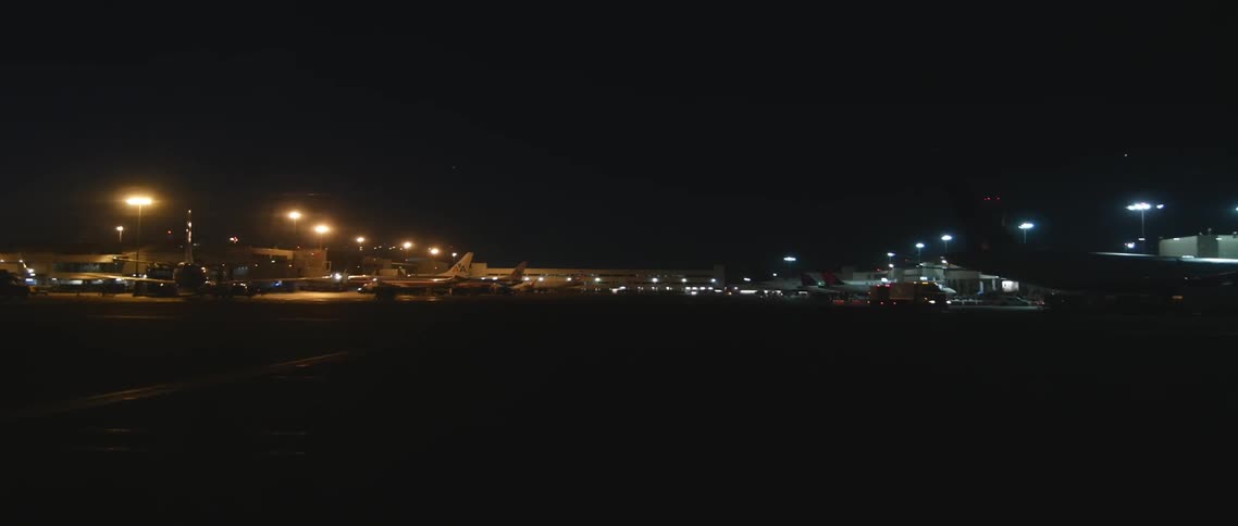 An airport terminal at night