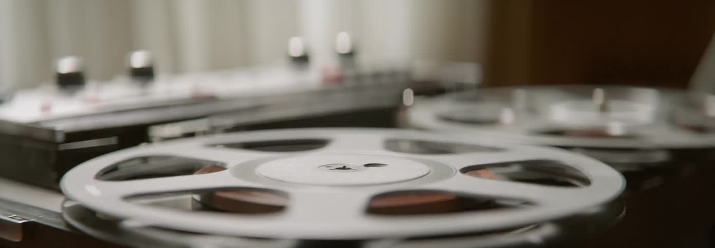 Film reels spin on a projector