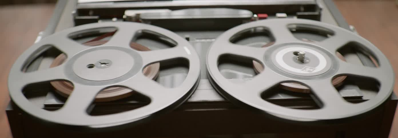 Film reels spin on a projector