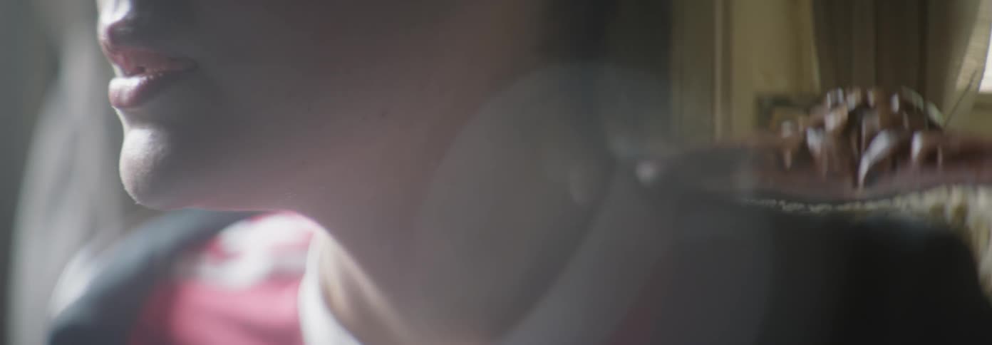 Person sits in a chair looking around