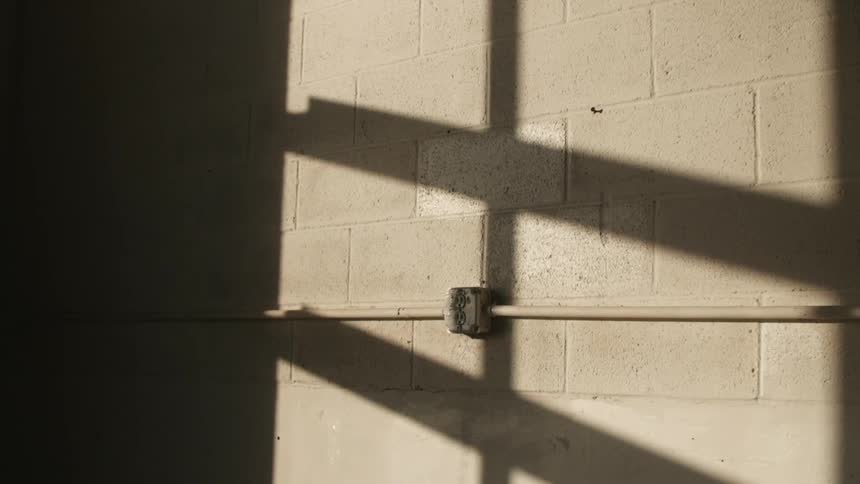 Brick wall with a power strip