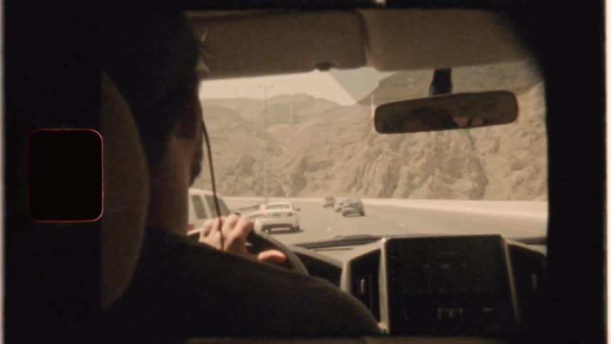 Man drives on a rural road