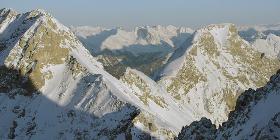Snow caps the tops of the mountains