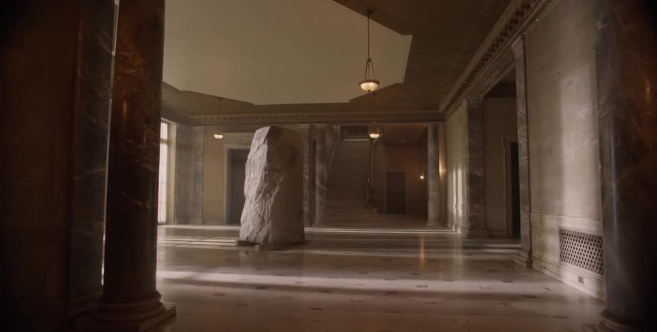 Large rock in the middle of a building