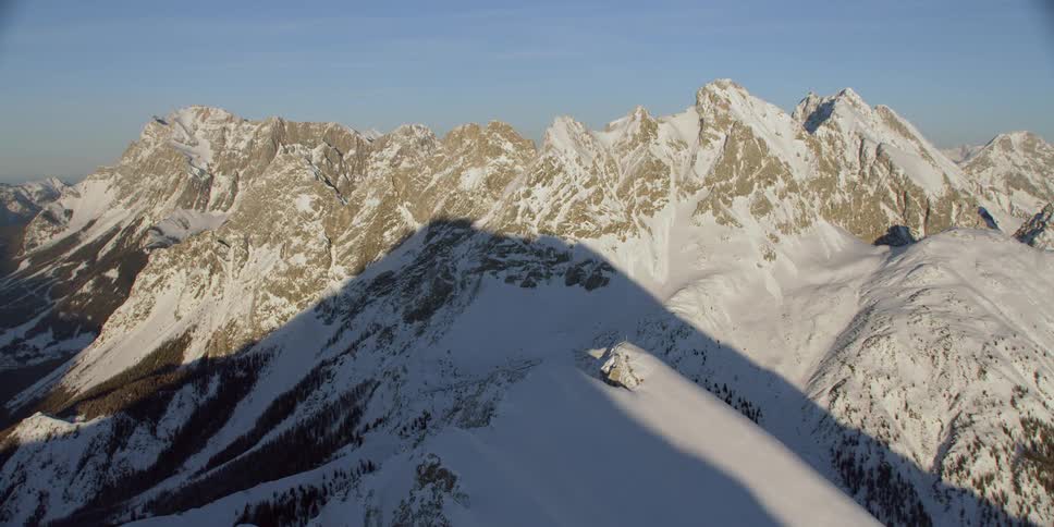 Snow covers the mountain landscape
