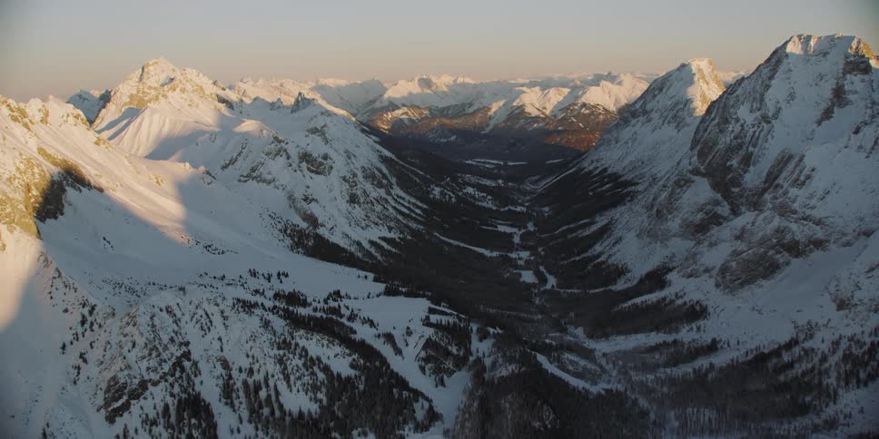 Snow covers the mountain landscape
