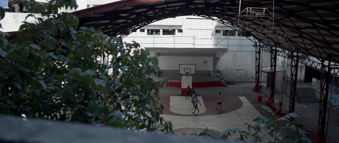 People play on a basketball court