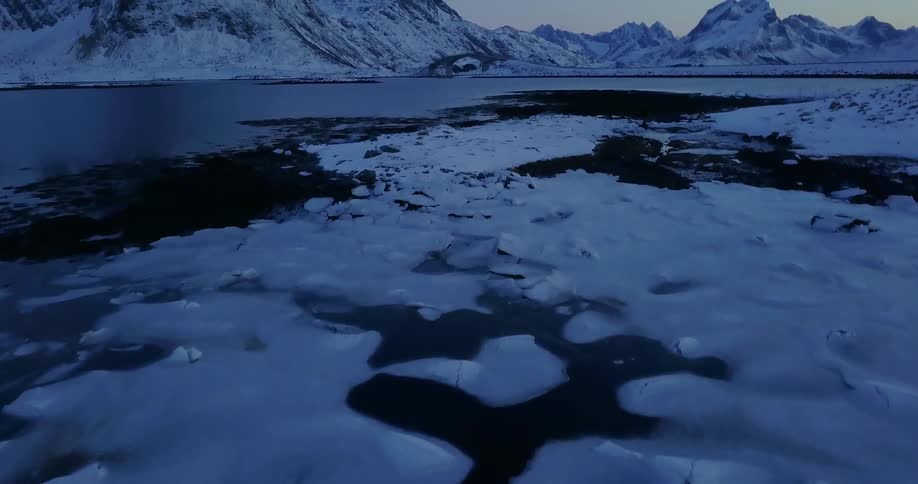 Ice is scattered across the antarctic waters