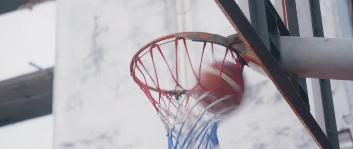 Basketball goes into the net