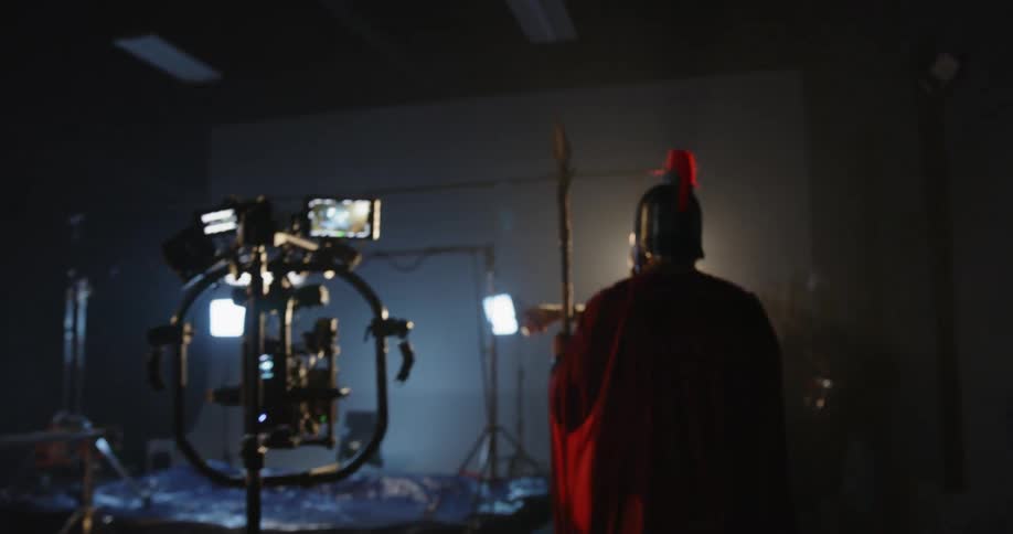 People film and direct in a movie set