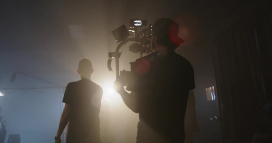 A film crew works on a film site