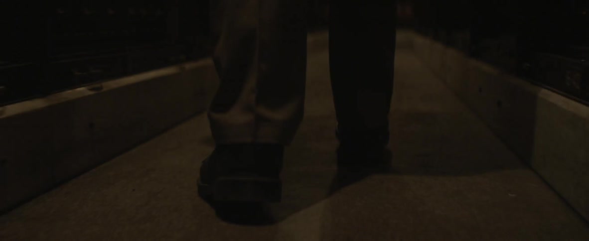 A person walking at night