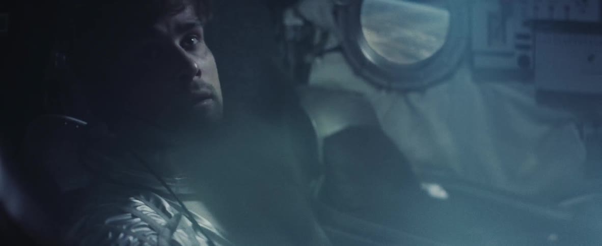An astronaut during a turbulent flight