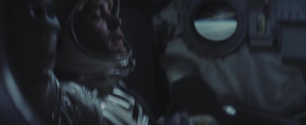 An astronaut holding on as his rocket violently shakes