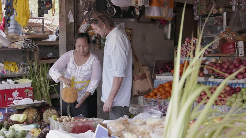 Man shops at a food market